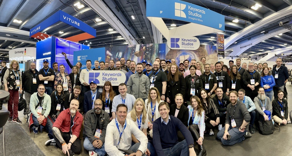 Keywords Team posing for a picture at GDC 23